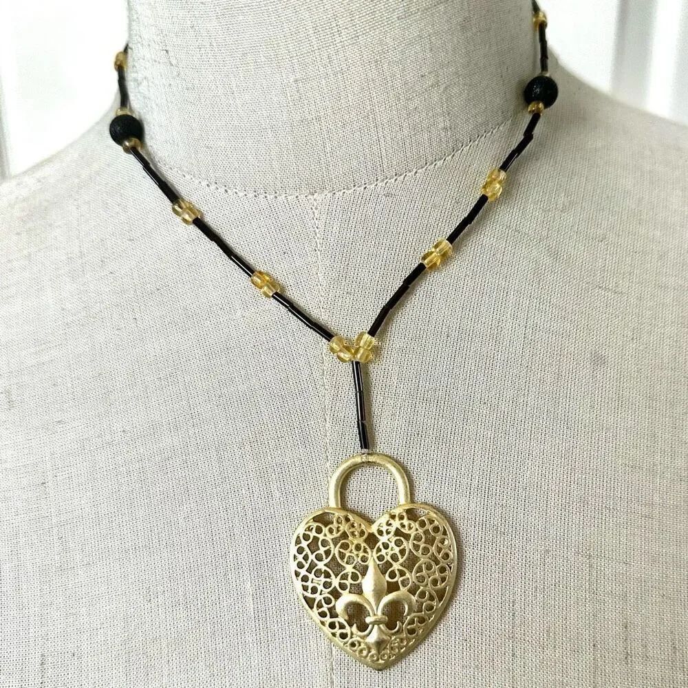Gold tone heart pendant necklace